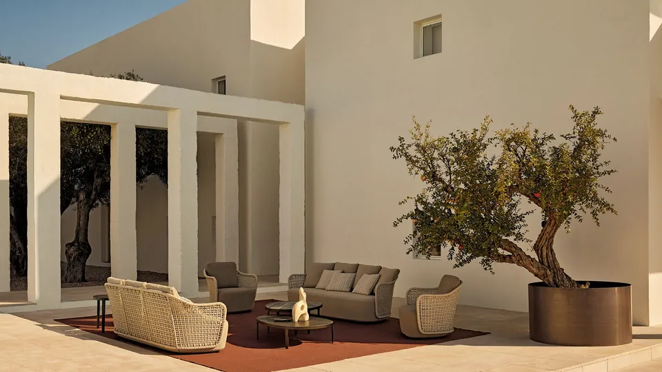 Poliform Mad Out woven outdoor sofa on a terrace, Poliform outdoor seating