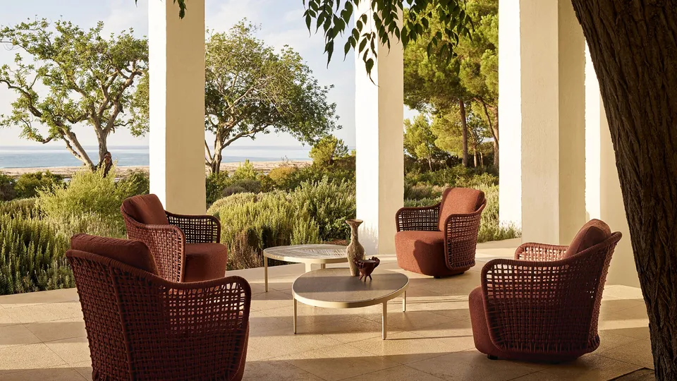 Poliform Mad Out armchair with a hand-woven rope back, modern outdoor furniture by Marcel Wanders